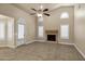 Living room with fireplace and tile flooring at 9478 E Corrine Dr, Scottsdale, AZ 85260