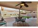 Covered patio with seating area and view of the backyard at 9478 E Corrine Dr, Scottsdale, AZ 85260