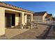 Patio area with seating and a partial view of the backyard at 2101 S Meridian Rd # 205, Apache Junction, AZ 85120