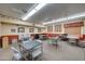 Community card room with tables and chairs at 2101 S Meridian Rd # 205, Apache Junction, AZ 85120