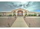 Elegant community center entrance with landscaping at 2101 S Meridian Rd # 205, Apache Junction, AZ 85120