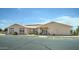 Community center building with parking and landscaping at 2101 S Meridian Rd # 205, Apache Junction, AZ 85120
