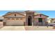 Charming single-story home with a two-car garage, stone accents, and desert landscaping for low maintenance at 2101 S Meridian Rd # 205, Apache Junction, AZ 85120