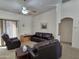 Living room with leather furniture and view to hallway at 2101 S Meridian Rd # 205, Apache Junction, AZ 85120