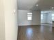 Bright living room with tile floors and large windows at 24126 W Sunland Ave, Buckeye, AZ 85326