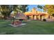 Community BBQ area with picnic tables and green lawn at 540 N May St # 2109, Mesa, AZ 85201