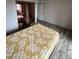 Bedroom with double bed, mirrored closet, and wood-look floors at 540 N May St # 2109, Mesa, AZ 85201