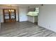 Open dining area with wood-look floors and kitchen access at 540 N May St # 2109, Mesa, AZ 85201