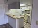 Bright kitchen boasts granite counters and updated cabinetry at 540 N May St # 2109, Mesa, AZ 85201