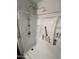 Walk-in shower with grab bars and built-in shelving at 540 N May St # 2109, Mesa, AZ 85201