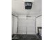 Garage features a white paneled door and automatic door opener at 5738 N 68Th Ave, Glendale, AZ 85303