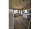 Updated kitchen with white cabinets and light countertops, new floors at 5738 N 68Th Ave, Glendale, AZ 85303