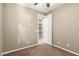 Bedroom with carpet and view of shelving through the doorway to closet at 14859 W Surrey Dr, Surprise, AZ 85379