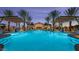 Resort-style pool with illuminated waters at night at 3533 N 159Th Ln, Goodyear, AZ 85395