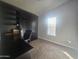 Bedroom with built-in desk and shelving at 650 N Hawes Rd # 3729, Mesa, AZ 85207