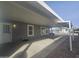 Covered carport with paver driveway and exterior lighting at 650 N Hawes Rd # 3729, Mesa, AZ 85207