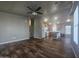 Spacious living room with ceiling fan and tile floors at 650 N Hawes Rd # 3729, Mesa, AZ 85207