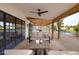 Relaxing covered patio with pool view and seating at 12801 N 65Th Pl, Scottsdale, AZ 85254