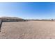 Massive undeveloped lot with covered patio in the distance at 13524 W Sierra Vista Dr, Glendale, AZ 85307