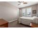 Comfortable bedroom with shuttered windows and carpet flooring at 13524 W Sierra Vista Dr, Glendale, AZ 85307