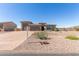 Attractive single-Gathering home with a paver driveway, desert landscaping, and a three-car garage at 13524 W Sierra Vista Dr, Glendale, AZ 85307