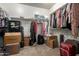 Spacious walk-in closet with ample storage, shelving, and hanging space for clothes and accessories at 13524 W Sierra Vista Dr, Glendale, AZ 85307