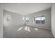 Bright bedroom featuring carpet and multiple windows at 2233 W Hide Trl, Phoenix, AZ 85085