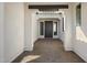 Covered entryway with arched doorways and tile flooring at 2233 W Hide Trl, Phoenix, AZ 85085