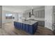 Modern kitchen with gray cabinets, white quartz countertops and a blue island at 2233 W Hide Trl, Phoenix, AZ 85085