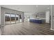 Modern kitchen with gray cabinets, white quartz countertops, and a blue island at 2233 W Hide Trl, Phoenix, AZ 85085