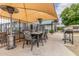 Enjoy outdoor dining on this spacious patio, complete with shade and a barbecue grill at 2608 W Berridge Ln # 220, Phoenix, AZ 85017