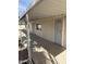 Side view of the covered patio area of the manufactured home at 3330 E Main St # 36, Mesa, AZ 85213