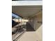 Long covered walkway alongside the manufactured home providing shade and protection at 3330 E Main St # 36, Mesa, AZ 85213