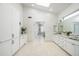 Luxurious bathroom with marble countertops and a large walk-in shower at 10413 N 118Th Pl, Scottsdale, AZ 85259