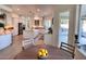 Spacious kitchen with island, stainless steel appliances, and white cabinetry at 10413 N 118Th Pl, Scottsdale, AZ 85259