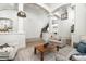 Elegant living area with a stunning staircase at 10413 N 118Th Pl, Scottsdale, AZ 85259