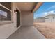 Covered patio with access from sliding glass door, offering outdoor space at 18350 W Poston Dr, Surprise, AZ 85387