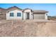 Single-story home with attached garage and desert landscaping at 27112 N 148Th Dr, Surprise, AZ 85387