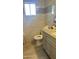 Updated bathroom with new vanity and tile flooring at 3155 S 127Th Ave, Avondale, AZ 85323