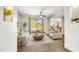 Inviting living room with neutral tones, tile floors, and sliding glass doors to the outdoor area at 37801 N Cave Creek Rd # 13, Cave Creek, AZ 85331