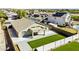 An aerial view of the property featuring a lush green lawn and a covered patio at 43205 W Askew Dr, Maricopa, AZ 85138