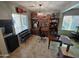 Comfortable home office with natural light, a built-in bookcase, and desk at 926 W Ayrshire Trl, San Tan Valley, AZ 85143