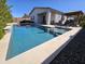 Backyard pool with gazebo and outdoor seating; perfect for entertaining or relaxing at 926 W Ayrshire Trl, San Tan Valley, AZ 85143