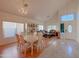 Bright dining room features a chandelier and hardwood floors at 1342 N Mckenna Ln, Gilbert, AZ 85233