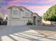 Two-story house with attached garage and landscaped yard at 1342 N Mckenna Ln, Gilbert, AZ 85233