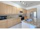 Modern kitchen with granite countertops and ample cabinetry at 1342 N Mckenna Ln, Gilbert, AZ 85233