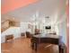 Spacious living room with a grand piano and built-in shelving at 1342 N Mckenna Ln, Gilbert, AZ 85233