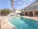 Inviting kidney shaped pool with flagstone decking and BBQ area at 1342 N Mckenna Ln, Gilbert, AZ 85233