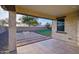 Covered patio with fire pit and view of grassy backyard at 4360 N 186Th Ln, Goodyear, AZ 85395