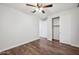 Simple bedroom with hardwood floors, ceiling fan and closet at 4360 N 186Th Ln, Goodyear, AZ 85395